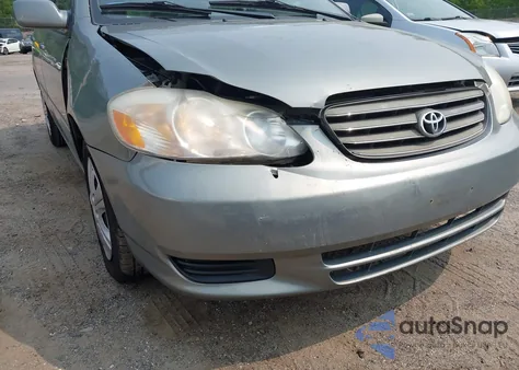 2004 Toyota Corolla Le z USA, uszkodzony, nr VIN 2T1BR32E74C251070